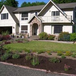 New planting bed reduces size of the lawn.
